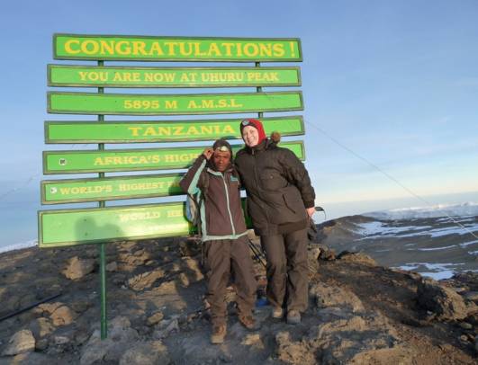 Mit Guide Mathew am Uhuru Peak